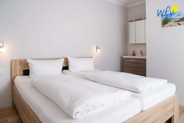 Schlafzimmer Apartmenthaus Roberta Ferienwohnung Seehund