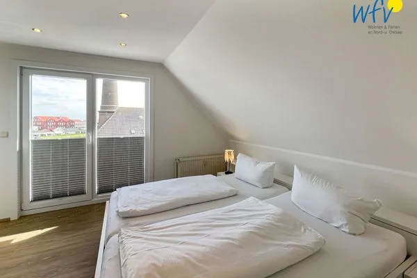 Schlafzimmer Apartmenthaus Roberta Ferienwohnung Meerblick