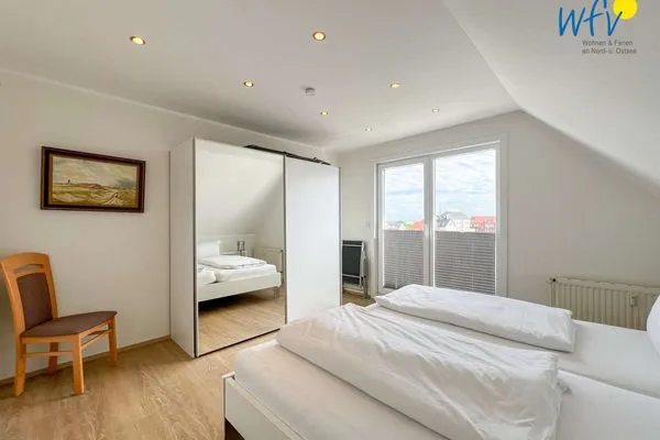 Schlafzimmer Apartmenthaus Roberta Ferienwohnung Meerblick