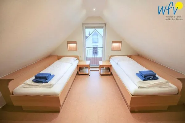Schlafzimmer Maisonette-Wohnungen am Steingarten Ferienwohnungen 1 und 2