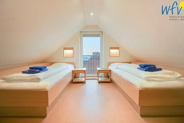 Schlafzimmer Maisonette-Wohnungen am Steingarten Ferienwohnungen 1 und 2