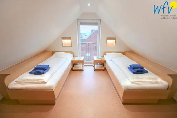 Schlafzimmer Maisonette-Wohnungen am Steingarten Ferienwohnungen 1 und 2