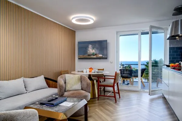 Wohnzimmer  FeWo Dwarslöper - Balkon, Sauna, Meerblick