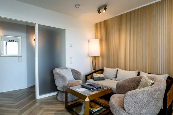 Wohnzimmer  FeWo Dwarslöper - Balkon, Sauna, Meerblick