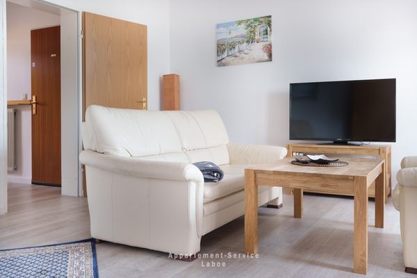  FeWo Sandkorn Laboe - Wohnzimmer
