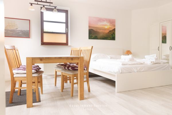  FeWo Sandkorn Laboe - Wohnzimmer
