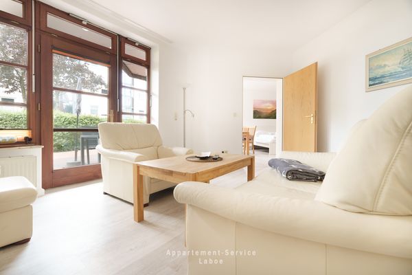  FeWo Sandkorn Laboe - Wohnzimmer