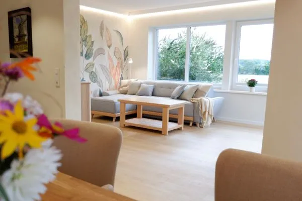 Blick in den Wohnbereich im Wintergarten  Ferienhaus Landliv Hus