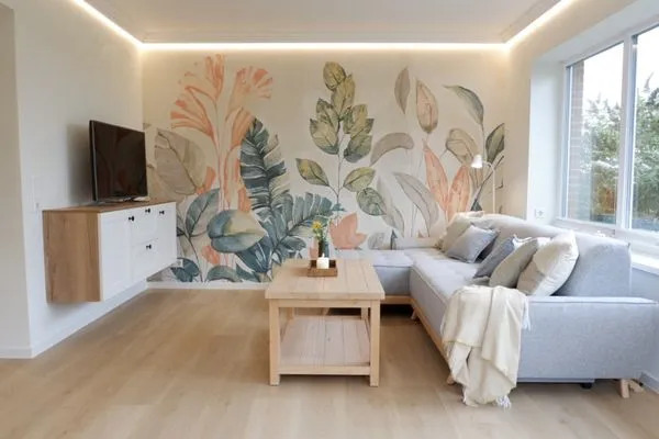 Wohnbereich mit gemütlichem Sofa und Smart-TV  Ferienhaus Landliv Hus