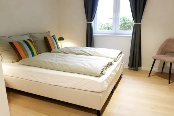 Schlafzimmer zur Gartenseite  Ferienhaus Landliv Hus