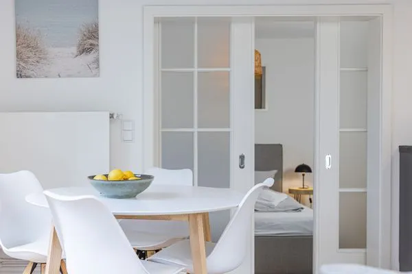 Wohnzimmer Haffperle Küstenglanz - zentral in Haffkrug, nur wenige Schritte zum Strand