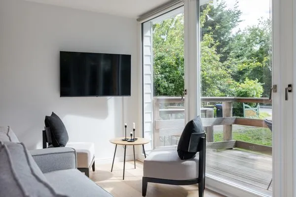 Wohnzimmer Haffperle Küstenglanz - zentral in Haffkrug, nur wenige Schritte zum Strand