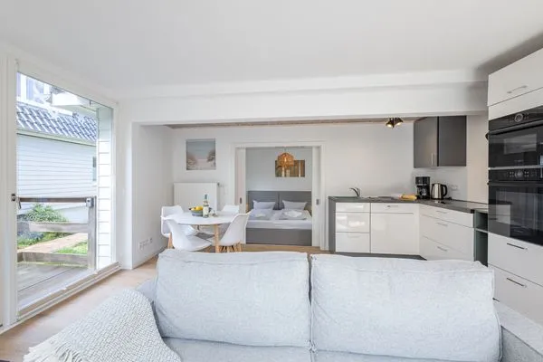 Wohnzimmer Haffperle Küstenglanz - zentral in Haffkrug, nur wenige Schritte zum Strand