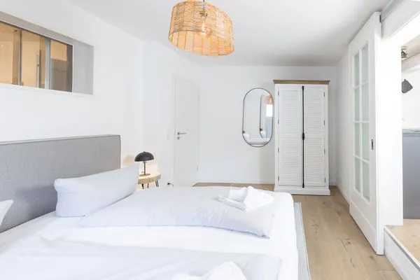 Schlafzimmer Haffperle Küstenglanz - zentral in Haffkrug, nur wenige Schritte zum Strand