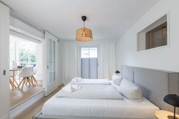 Schlafzimmer Haffperle Küstenglanz - zentral in Haffkrug, nur wenige Schritte zum Strand