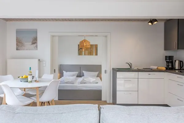 Wohnzimmer Haffperle Küstenglanz - zentral in Haffkrug, nur wenige Schritte zum Strand