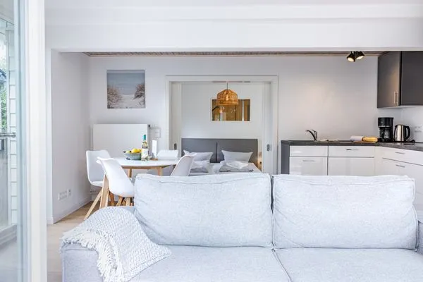 Wohnzimmer Haffperle Küstenglanz - zentral in Haffkrug, nur wenige Schritte zum Strand