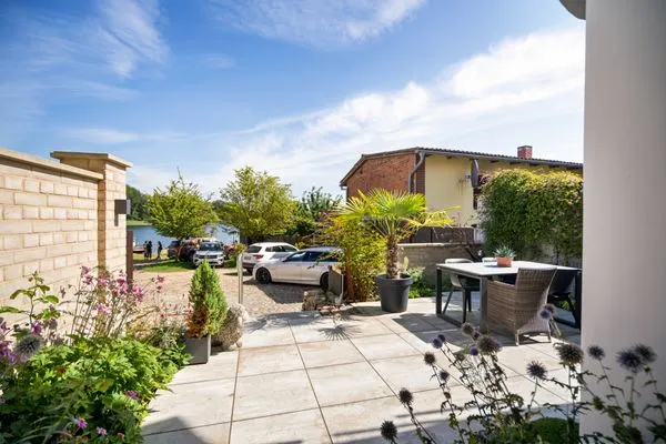 Ferienhaus Wasserblick Inselstadt Malchow - untere Terrasse Ausblick zum See  Wasserblick