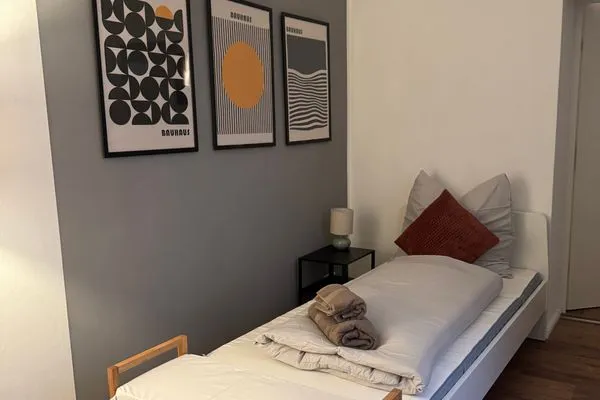 Schlafzimmer  Gemütliches Appartement "Hans" in Köthen mit 4 Schlafzimmern