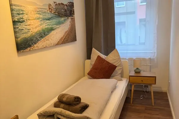 Schlafzimmer  Gemütliches Appartement "Hans" in Köthen mit 4 Schlafzimmern