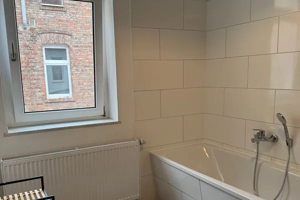 Badezimmer  Gemütliches Appartement "Peter" in Köthen mit 3 Schlafzimmern