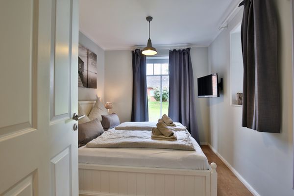 Bootshaus I Zuhause im Bootshaus Nordsee - Schlafzimmer