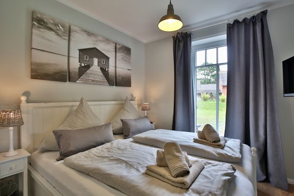 Bootshaus I Zuhause im Bootshaus Nordsee - Schlafzimmer