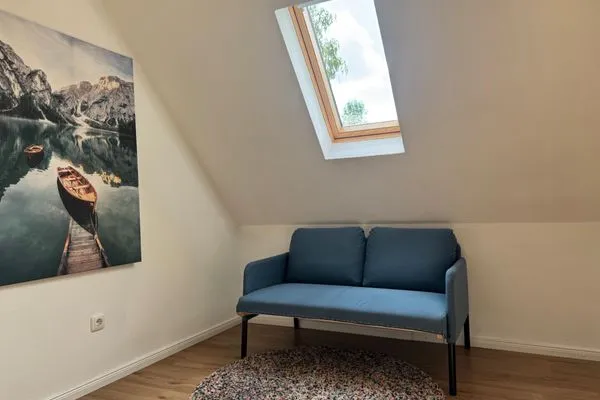 Wohnzimmer  Ferienhaus "Jasmine" in Hettstedt mit 3 Schlafzimmern