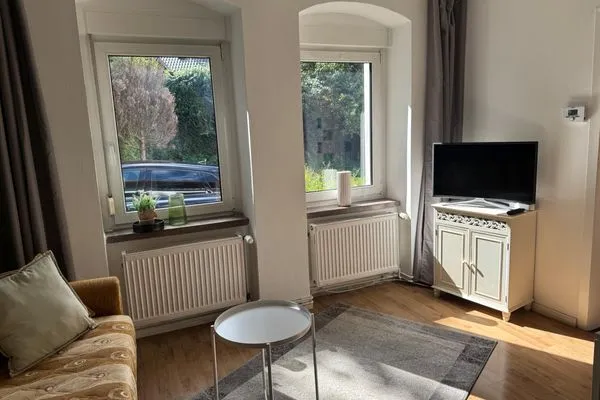 Wohnzimmer  Ferienhaus "Jasmine" in Hettstedt mit 3 Schlafzimmern