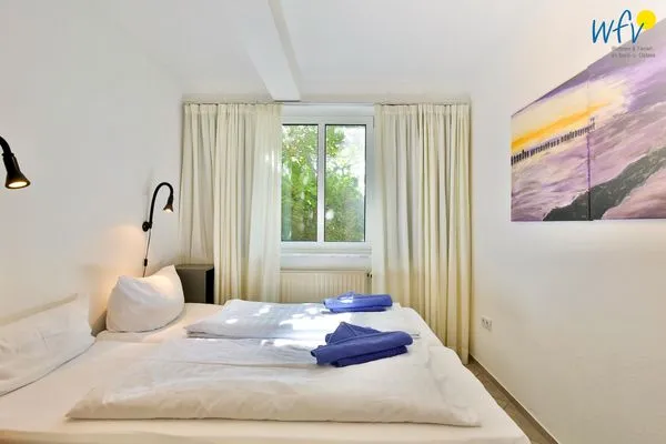 Schlafzimmer Haus Dünenblick Ferienwohnung 1