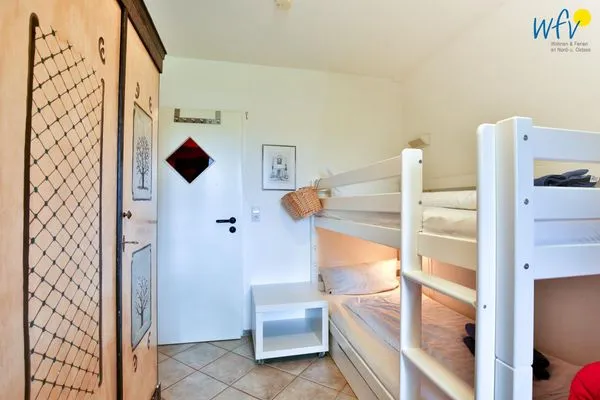 Schlafzimmer Haus Dünenblick Ferienwohnung 1