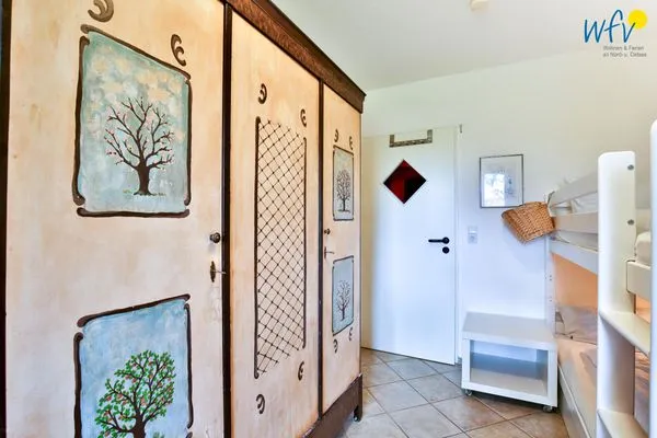 Schlafzimmer Haus Dünenblick Ferienwohnung 1