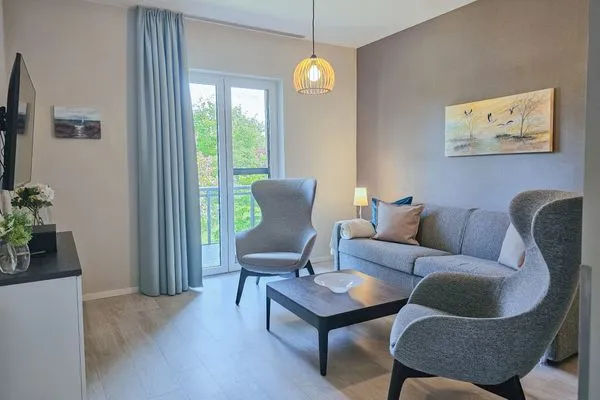 Ferienwohnung Kroonkieker Ostseebad Wustrow - ZweiWasser Alte Seefahrtschule Wohnzimmer  Kroonkieker