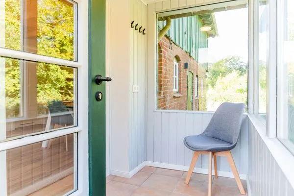 Eingangsbereich mit Garderobe  Ferienwohnung Hanna im Reethus Mühlenlund