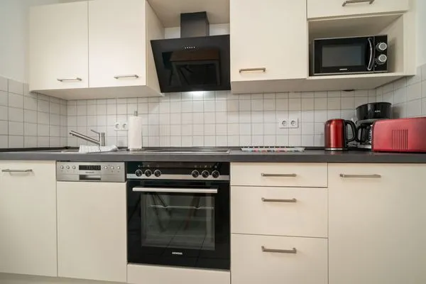 Ferienwohnung Jette Waren (Müritz) - Küchenzeile mit Herd  Jette