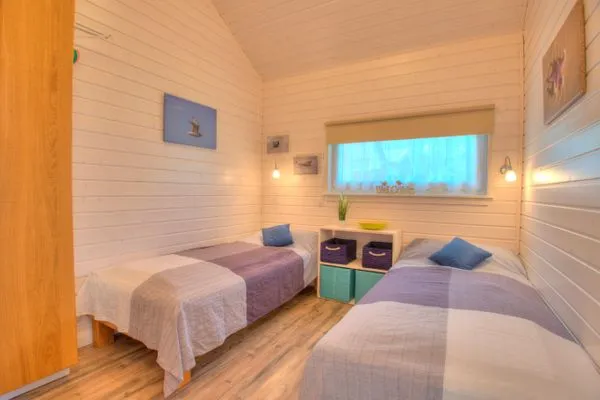 Schlafzimmer  Ferienhaus "Marielund" im Ferienpark Holm an der Ostsee