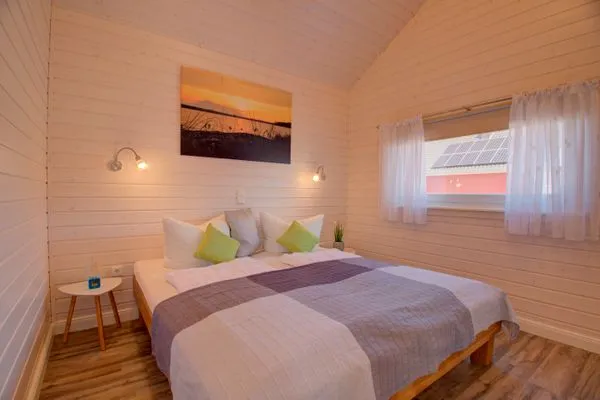 Schlafzimmer  Ferienhaus "Marielund" im Ferienpark Holm an der Ostsee