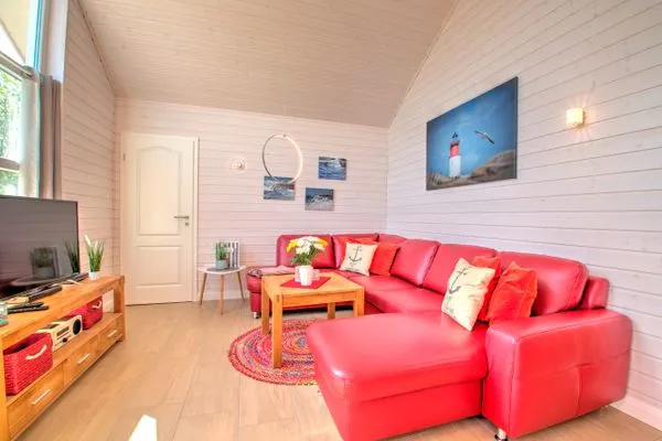 Wohnzimmer  Ferienhaus "Marielund" im Ferienpark Holm an der Ostsee