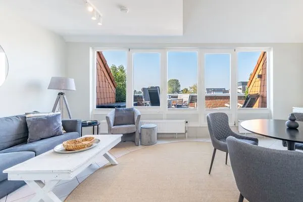 Wohnzimmer  Heimathafen - direkt am Strand mit Sonnenbalkon