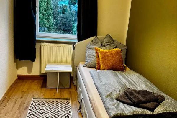 Schlafzimmer  Ferienhaus "Hagen" in Schkopau mit 3 Schlafzimmern