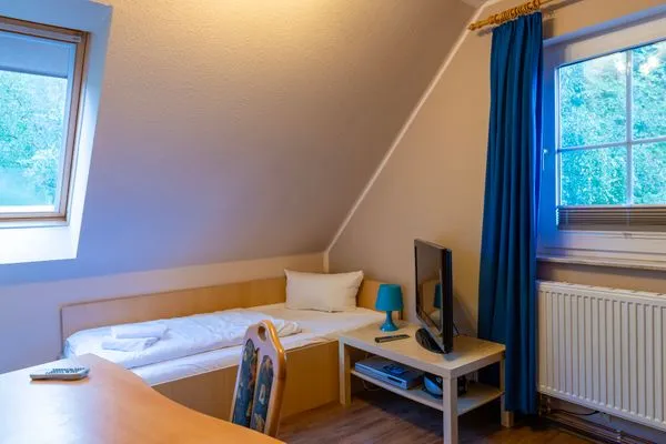 Schlafzimmer mit Einzelbetten Am Deich Am Deich Haus 32