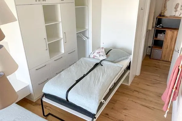 Schrankbett im Schlafzimmer Haus Südwind Ferienwohnung Wellenblick