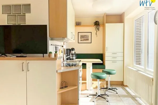 Wohnzimmer Ferienhäuser Jadehörn Ferienwohnungen Sandfloh + Sonnenstern