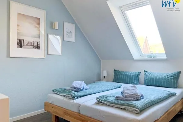 Schlafzimmer Ferienhäuser Jadehörn Ferienwohnungen Sandfloh + Sonnenstern