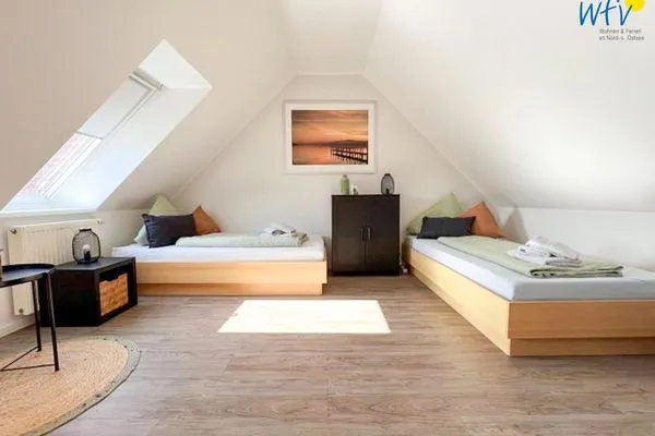 Schlafzimmer Ferienhäuser Jadehörn Ferienwohnungen Sandfloh + Sonnenstern