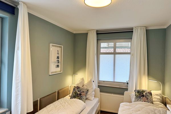Schlafzimmer 2 mit zwei Einzelbetten