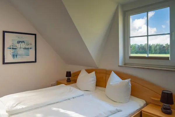 Schlafzimmer mit Doppelbett Am Deich Am Deich Haus 36