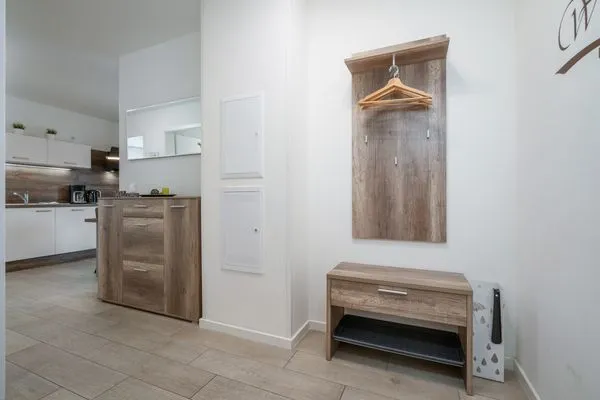 Ferienwohnung Müritztraum Waren (Müritz) - Praktischer Eingangsbereich mit Garderobe  Müritztraum
