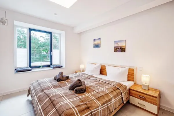 Schlafzimmer: Doppelbett (180x200)  FeWo Abendrot in PRORA - 6.11