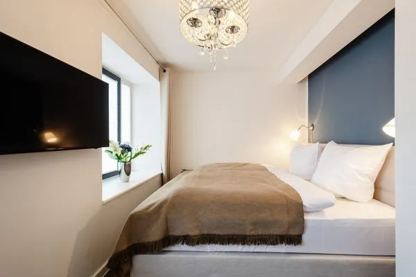 Schlafzimmer 2: Doppelbett (180x200), TV  FeWo Ambiente in PRORA - 6.31